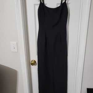 Long black dress with jacket.